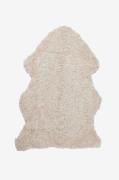 Skinnwille - Fårskinnsfäll Curly - Beige - Fällar & skinnmattor - Från...