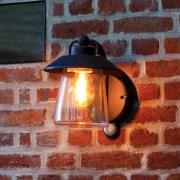 LUTEC CATE utomhusvägglampa med sensor, svart, 22 cm, IP44, E27