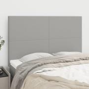 vidaXL Sänggavel ljusgrå 144x5x118/128 cm tyg