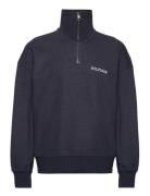 Tommy Hilfiger Monotype H Ycomb 1/4 Zip Marinblå