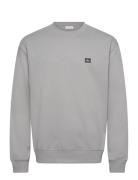 Calvin Klein Jeans Ls 350Terry Eu Whsl Badge Crewne Vit
