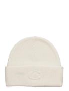 Coach Accessories Embossed C Knit Beanie Kräm